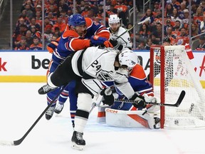 Phillip Danault of the Los Angeles Kings watches his shot go past Stuart Skinner of the Edmonton Oilers in the second period in Game Two of the First Round of the 2023 Stanley Cup Playoffs on April 19, 2023 at Rogers Place in Edmonton, Alberta, Canada.