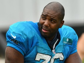 Russell Okung of the Carolina Panthers waits between drills during a training camp session at Bank of America Stadium on August 24, 2020 in Charlotte, North Carolina.