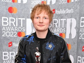 Ed Sheeran poses with his award in the media room during The BRIT Awards 2022 at The O2 Arena on February 8, 2022 in London.