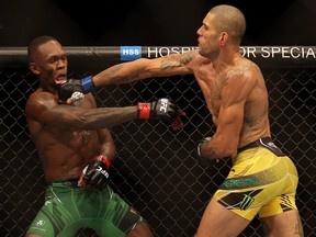 Alex Pereira battles Israel Adesanya during their Middleweight fight at UFC 281 at Madison Square Garden on November 12, 2022 in New York City.