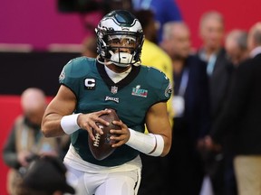 Jalen Hurts of the Philadelphia Eagles warms up before playing against the Kansas City Chiefs in Super Bowl LVII at State Farm Stadium on February 12, 2023 in Glendale, Arizona.