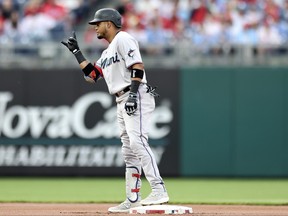 Luis Arraez of the Miami Marlins reacts after hitting a double during the first inning against the Philadelphia Phillies at Citizens Bank Park on April 11, 2023 in Philadelphia.