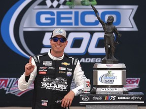 Kyle Busch, driver of the #8 McLaren Custom Grills Chevrolet, celebrates in victory lane after winning the NASCAR Cup Series GEICO 500 at Talladega Superspeedway on April 23, 2023 in Talladega, Alabama.