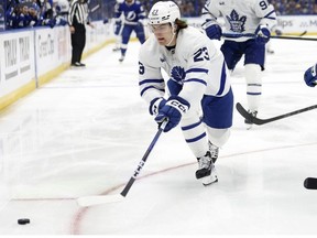 Matthew Knies of the Toronto Maple Leafs looks to pass in the first period during  Game Four of the First Round of the 2023 Stanley Cup Playoffs against the Tampa Bay Lightning at Amalie Arena on April 24, 2023 in Tampa, Florida.