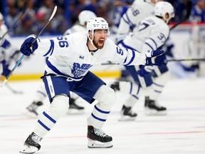 Erik Gustafsson of the Toronto Maple Leafs celebrate winning Game 6 of the First Round of the 2023 Stanley Cup Playoffs on an overtime goal by John Tavares against the Tampa Bay Lightning at Amalie Arena on April 29, 2023 in Tampa, Fla.