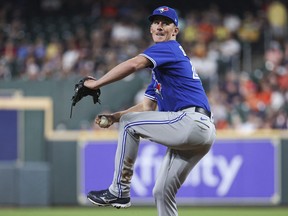 Toronto Blue Jays starting pitcher Chris Bassitt delivers a pitch during the second inning against the Houston Astros at Minute Maid Park.