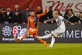 New York City forward Kevin O'Toole blocks a shot by Toronto FC forward Federico Bernardeschi.