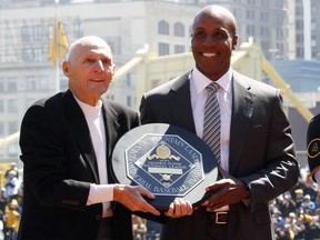 Former Pirate MVPs Dick Groat and Barry Bonds during Opening Day at PNC Park on March 31, 2014 in Pittsburgh, Pennsylvania.