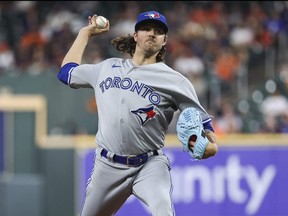 Apr 17, 2023; Houston, Texas, USA; Toronto Blue Jays starting pitcher Kevin Gausman (34) delivers a pitch during the second inning against the Houston Astros at Minute Maid Park.