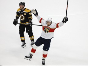 Florida Panthers defenceman Brandon Montour celebrates his goal as Boston Bruins left wing Brad Marchand skates away during the third period of game two of the first round of the 2023 Stanley Cup Playoffs at TD Garden in Boston, April 19, 2023.