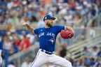 Blue Jays' Anthony Bass delivers a pitch during a spring training game against the New York Yankees at TD Ballpark in Dunedin, Fla., Saturday, March 18, 2023. 