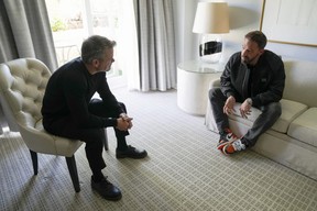 Ben Affleck, right, and Matt Damon chat during a portrait to promote the film “Air” at the Four Seasons Hotel in Los Angeles.