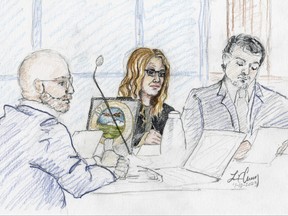 This courtroom sketch, from left, depicts Madison County prosecutor Rob Wood, Lori Vallow Daybell and defence attorney Jim Archibald during opening statements of Vallow Daybell's murder trial in Boise, Idaho, Monday, April 10, 2023.  (Lisa C. Cheney via AP)