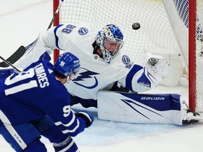 Maple Leafs captain  John Tavares scores on Tampa Bay Lightning goaltender Andrei Vasilevskiy  during second period NHL first round Stanley Cup playoff hockey action in Toronto, on Thursday, April 20, 2023.