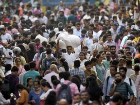 People throng a market place in Mumbai, India, Monday, April 24, 2023. The United Nations says India will be the world’s most populous country by the end of this month, eclipsing an aging China.