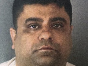 This booking photo released by the Riverside County Sheriff's Department shows Anurag Chandra, 42 of Corona, Calif., on Jan. 20, 2020.