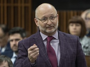 Minister of Justice and Attorney General of Canada David Lametti rises during Question Period, in Ottawa, Wednesday, March 29, 2023. THE CANADIAN PRESS/Adrian Wyld