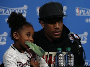 Raptors DeMar DeRozan with his daughter Diar while playing for the Raptors in 2017.