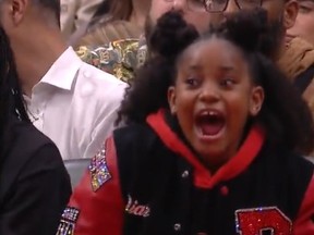 Diar DeRozan, daughter of Chicago Bulls' DeMar DeRozan, screams during a free throw session.