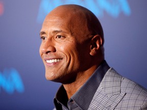 Dwayne Johnson poses at the world premiere of Walt Disney Animation Studios' "Moana" as a part of AFI Fest in Hollywood November 14, 2016.
