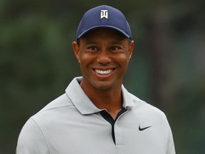 Tiger Woods smiles during a practice round at the Masters Tuesday, April 4, 2023 in Augusta, Ga. 
Tiger Woods of the U.S. on the 7th during a practice round REUTERS/Mike Segar