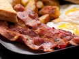 Bacon and eggs with hashbrowns and toast