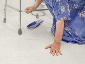 Elderly woman with walker falling in bathroom