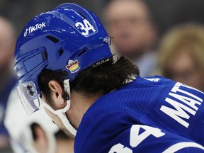 Maple Leafs' Auston Matthews wears a Pride-themed sticker on his helmet during the first period against the Columbus Blue Jackets in Toronto on Tuesday, April 4, 2023.