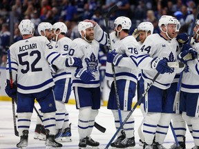 Maple Leafs celebrate after beating the Tampa Bay Lightning in overtime during game six of the first round of the 2023 Stanley Cup playoffs at Amalie Arena.