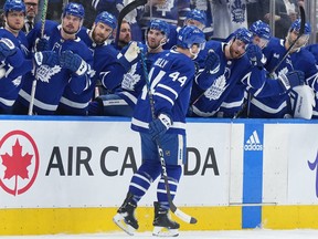 Toronto Maple Leafs defenceman Morgan Rielly (44) celebrates with teammates on the bench after scoring a goal against the Tampa Bay Lightning during the first period in game five of the first round of the 2023 Stanley Cup Playoffs at Scotiabank Arena April 27, 2023.