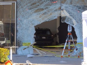 A view shows the crash site after a vehicle crashed into an Apple store in Hingham, Massachusetts, U.S. November 21, 2022.