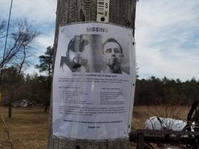 A poster announcing the disappearance of Keith Campbell and Justin Yeo, on a utility pole along Spring Creek Road at Legion Road, near where the remains of two people were found in the morning on Monday, April 3, 2023. (Scott Dunn/The Sun Times/Postmedia Network)