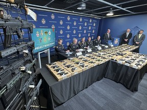 Toronto Police Supt.. Steve Watts (at the podium) is pictured at an April 11, 2023 press conference where police announced the seizure of 173 guns and the arrest of 42 people as part of Project Moneypenny. (Jack Boland/Toronto Sun)