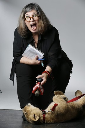 Rita DeMontis makes a new friend from the Bowmanville Zoo as the OSPCA promoted the Friends For Life Walk, September 9, 2014. Stan Behal/Toronto Sun