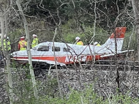A plane crashed on CN train tracks in Michigan.