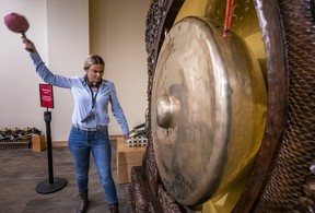 Erin Miller hits the gong at the Musical Instrument Museum (MIM) in Scottsdale. Ernest Doroszuk/Toronto Sun