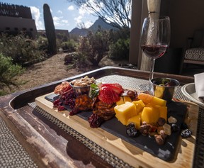 Enjoying red wine and a charcuterie board on the ground floor deck of a room at the Four Seasons Resort Scottsdale at Troon North. Ernest Doroszuk/Toronto Sun