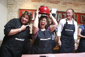 Rita DeMontis wins the “whip the cream” contest with Chefs Lynn Crawford, left, and Mark McEwan on Tuesday July 30, 2013 while promoting the Cook for the Cure in support of the Canadian Breast Cancer Foundation. Veronica Henri/Toronto Sun