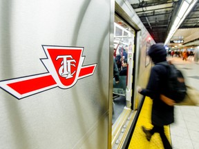 People board a TTC train arrives on the subway platform at Bloor-Yonge Station in Toronto, Jan. 23, 2015.