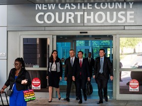 Dominion Voting Systems attorneys exit the Leonard L. Williams Justice Center as jury selection commences for a trial to decide whether Fox News should pay Dominion Voting Systems $1.6 billion for spreading election-rigging falsehoods, in Wilmington, Delaware, U.S. April 13, 2023.