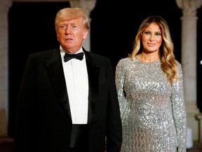 Former U.S. President Donald Trump, who announced a third run for the presidency in 2024, and his wife Melania Trump, attend the New Year's Eve party at his Mar-a-Lago resort in Palm Beach, Florida December 31, 2022.