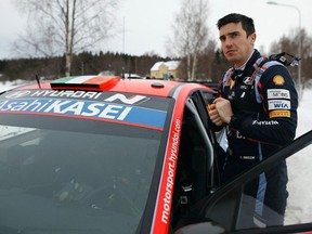 Craig Breen of Ireland stands by his Hyundai i20 N Rally1 HYBRID during the shakedown of the Rally Sweden, second round of the FIA World Rally Championship on February 9, 2023 in Hakmark, north of Umea, Sweden.