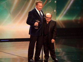 In this file photo, Arnold Schwarzenegger and Danny De Vito are pictured at the Golden Camera Awards in February 2015.