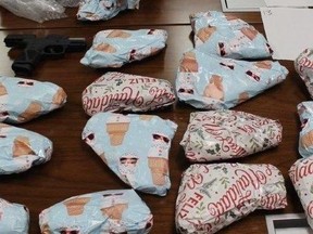 Guns wrapped in Christmas wrap seized as part of Project Moneypenny. HANDOUT/TPS