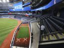 The new bullpens at the Rogers Centre have fans looking down on them. 