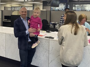 The registrar's office opened and mayoral candidates like current city councillor Brad Bradford with his daughter Briar and wife Kathryn came in to file their nomination paperwork at City Hall on Monday, April 3, 2023.