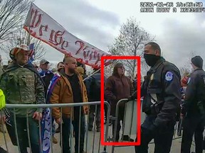 In this image from U.S. Capitol Police video, released and annotated by the Justice Department in the sentencing memorandum, Patrick McCaughey III,, appears on police body-worn camera footage at the U.S. Capitol on Jan. 6, 2021, in Washington.