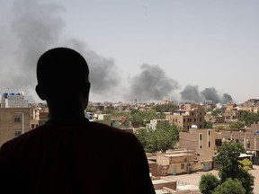 Smoke is seen in Khartoum, Sudan, Saturday, April 22, 2023.