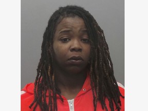 This photo provided by the St. Louis County Police shows Mary Curtis, 30, of St. Louis County, who is now facing two child endangerment charges.