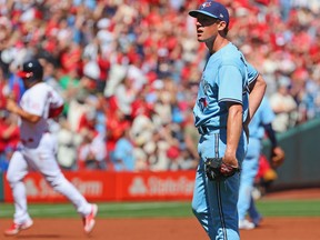 Blue Jays starting pitcher Chris Bassitt looks on after allowing his second home hun in the first inning against the St. Louis Cardinals at Busch Stadium on April 2, 2023 in St Louis.